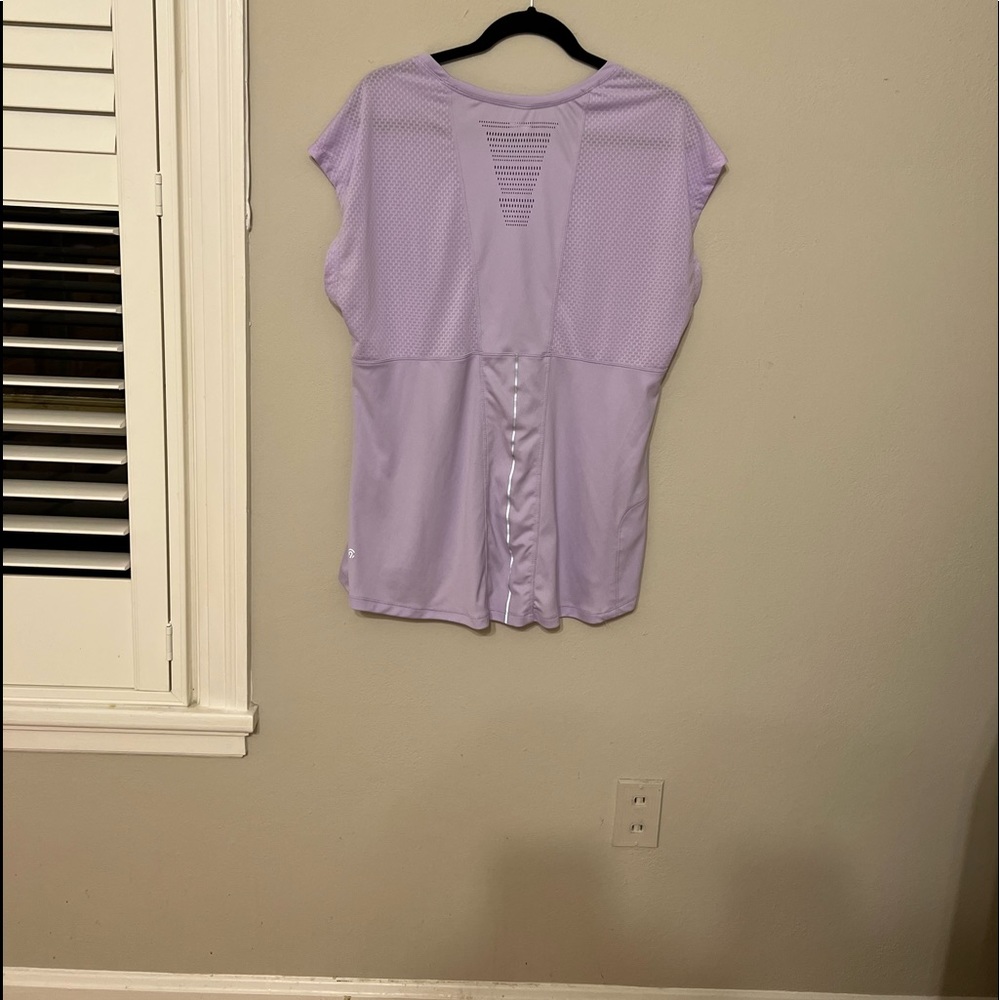 Athletic Shirt by champion.  Size XXL-  Lilac color, reflective grey stripe